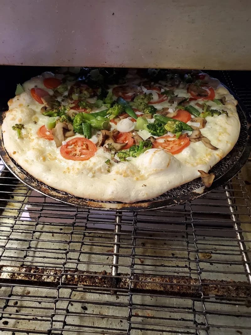 View of Pizza Sam's in Cadillac, MI