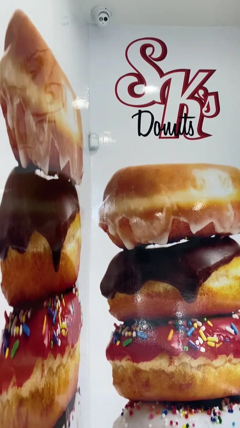 View of SK Donuts & Croissant in University, LA
