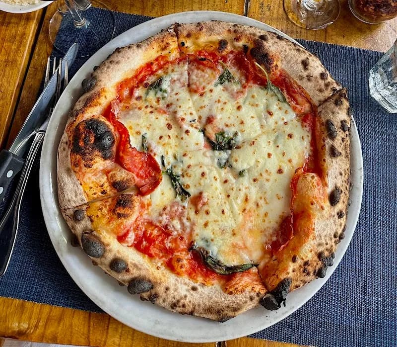 View of The Whistle Stop and Stone Oven Pizzeria in Key West, FL